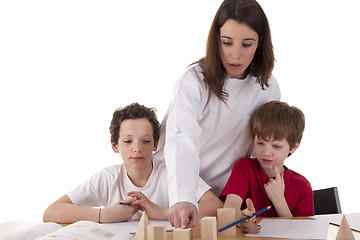 Image showing Two students with the teacher