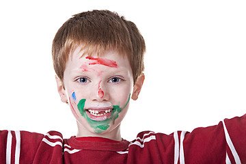 Image showing Children playing with paint, with painted face