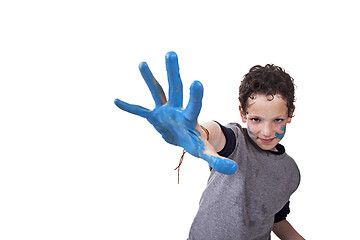 Image showing hand hint of blue, with the kid blurred
