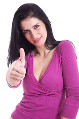 Image showing Young pretty women with thumb raised as a sign of success, thumbs up