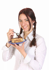 Image showing Beautiful woman eating piece of cake