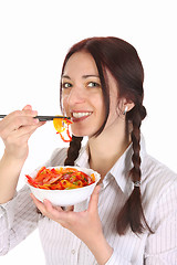 Image showing Beautiful woman eating with chopsticks