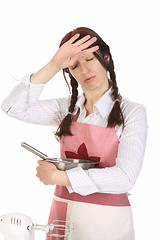 Image showing tired housewife preparing with egg beater