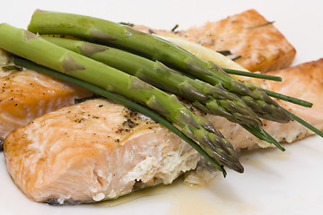 Image showing baked salmon and asparagus