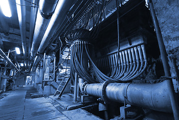 Image showing Pipes, tubes, machinery and steam turbine at a power plant