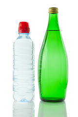 Image showing Bottles  of mineral water reflected on white background