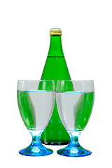 Image showing green bottle and glass of water