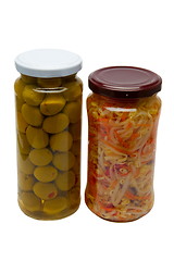 Image showing Glass jars with marinated vegetables  isolated on the white back