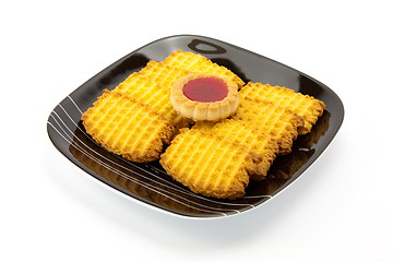 Image showing cookies on plate isolated on white backgrounds