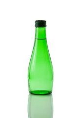 Image showing A bottle of mineral water reflected on white background