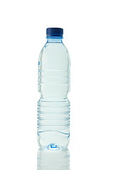 Image showing A bottle of mineral water reflected on white background