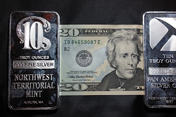 Image showing American money and silver bullion.