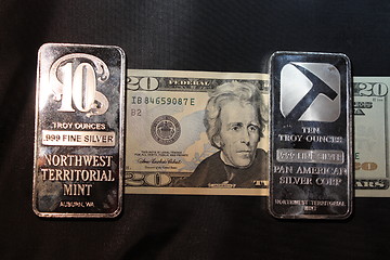 Image showing American money and silver bullion.