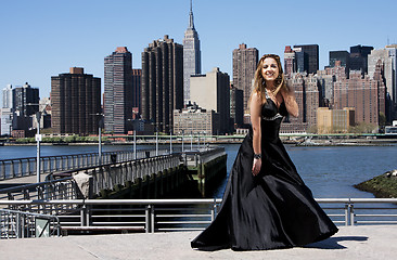 Image showing Woman in black cocktail dress