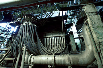 Image showing different size and shaped pipes at a power plant