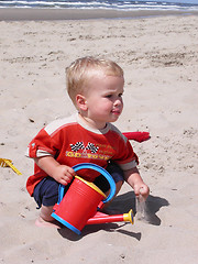 Image showing Little boy playing on the beach