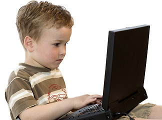 Image showing Boy working on a laptop