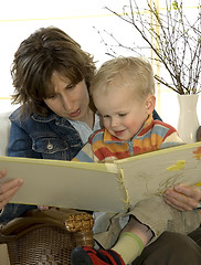 Image showing Mother and son reading