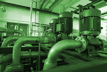 Image showing different size and shaped pipes and pumps