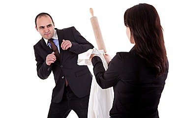 Image showing woman arguing with her husband, pointing to the rolling pin and a shirt with lipstick mark