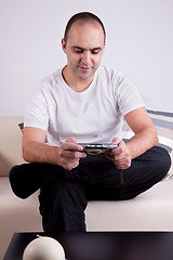 Image showing man playing video games