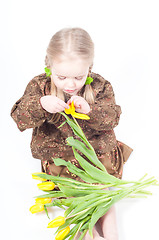 Image showing Little girl with flowers