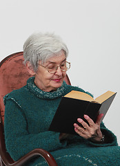 Image showing Old woman reading