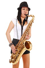 Image showing Chinese girl playing the saxophone.