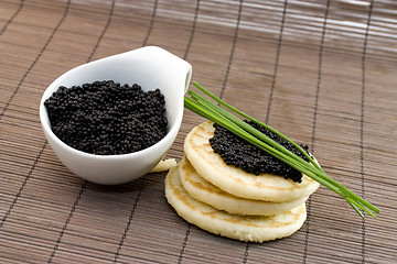 Image showing caviar and pancakes