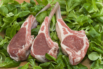 Image showing Racks of lamb on salad