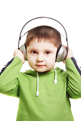 Image showing Serious kid with headphones