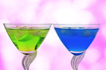 Image showing Cocktails against pink