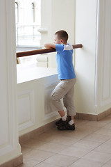 Image showing Boy standing alone
