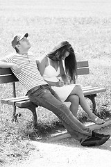 Image showing Couple on bench monochrome