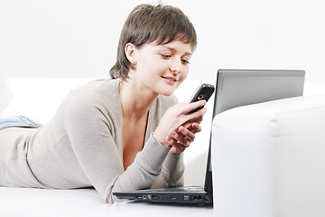 Image showing Woman reading message