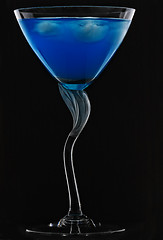 Image showing Blue cocktail in darkness