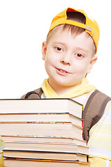 Image showing Boy in yellow with books