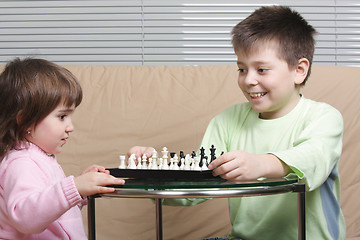Image showing Smiling chess players