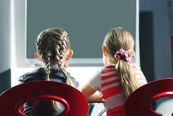 Image showing Girls watching television