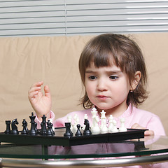 Image showing Girl playing chess