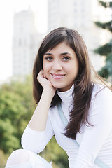 Image showing Smiling woman in white blouse