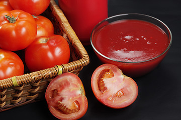 Image showing Ketchup and sliced tomato