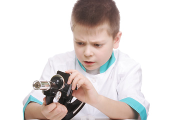 Image showing Kid with broken microscope