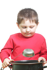 Image showing Boy in red with saucepan