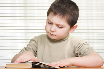Image showing Boy reading book