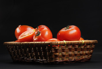 Image showing Basket with ripe tomatoes