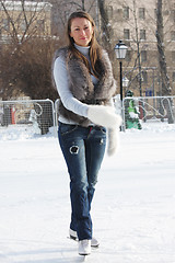 Image showing Serene ice-skating young woman