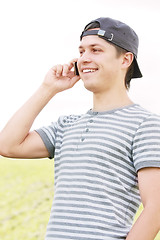 Image showing Positive guy with phone