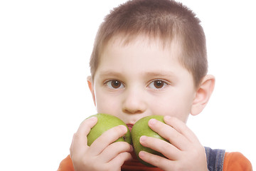 Image showing Boy with two green apples