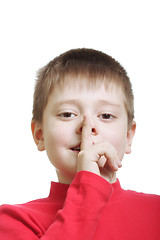 Image showing Kid in red gesturing hush sign